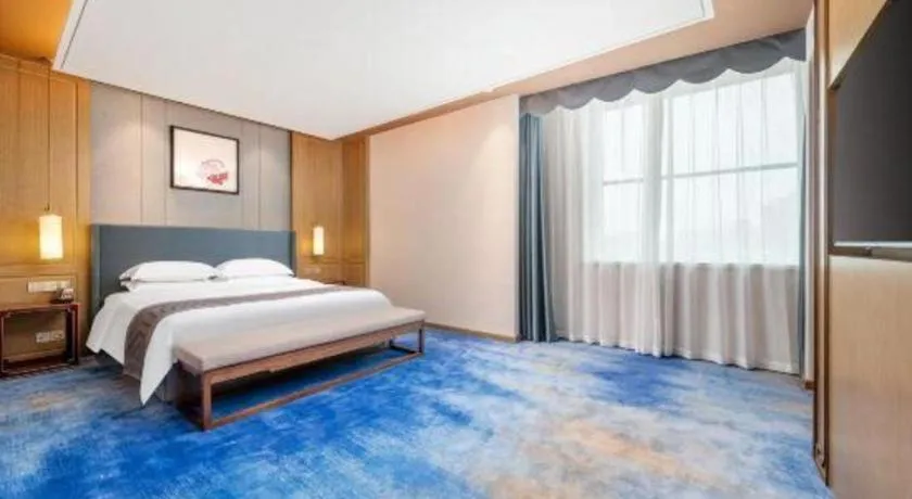 Bed in Bliss International Hotel Weihai