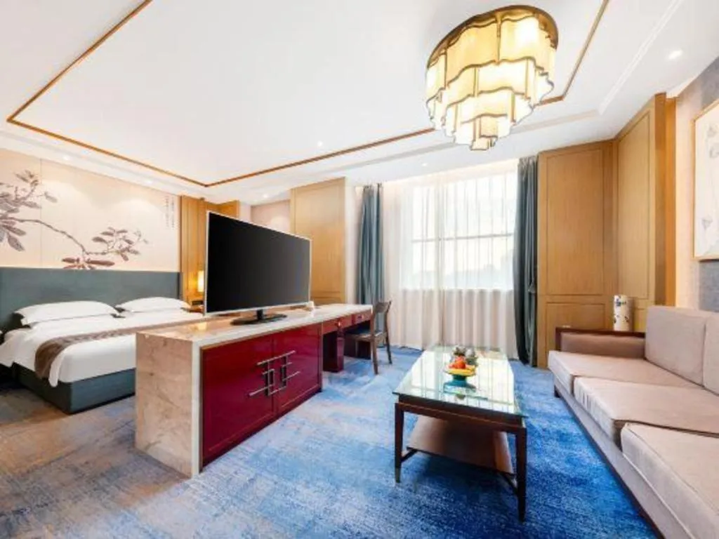 Bed in Bliss International Hotel Weihai