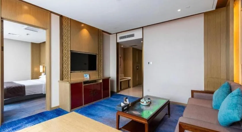 Bed in Bliss International Hotel Weihai