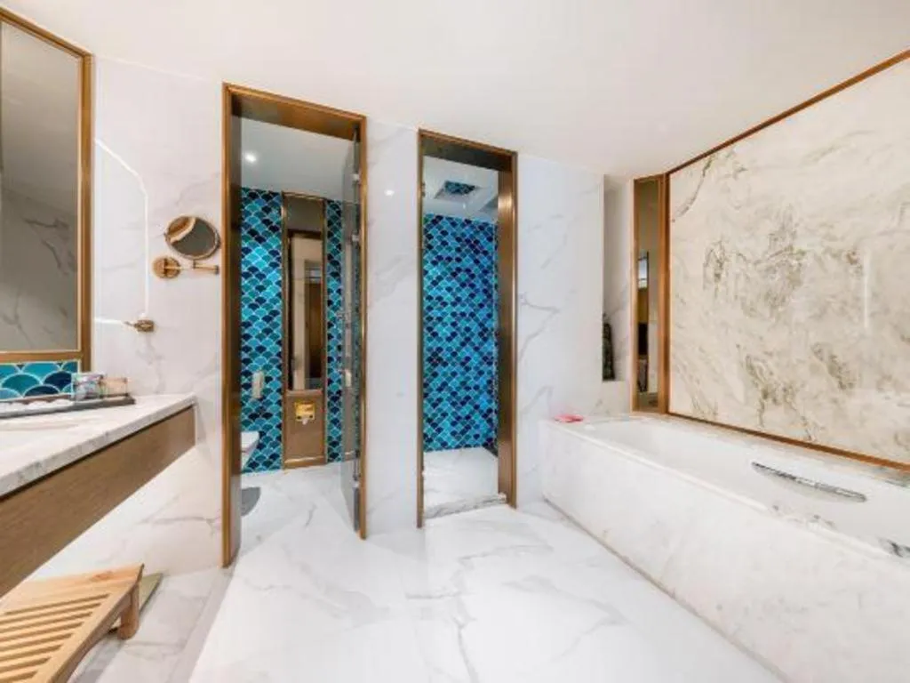 Bed in Bliss International Hotel Weihai