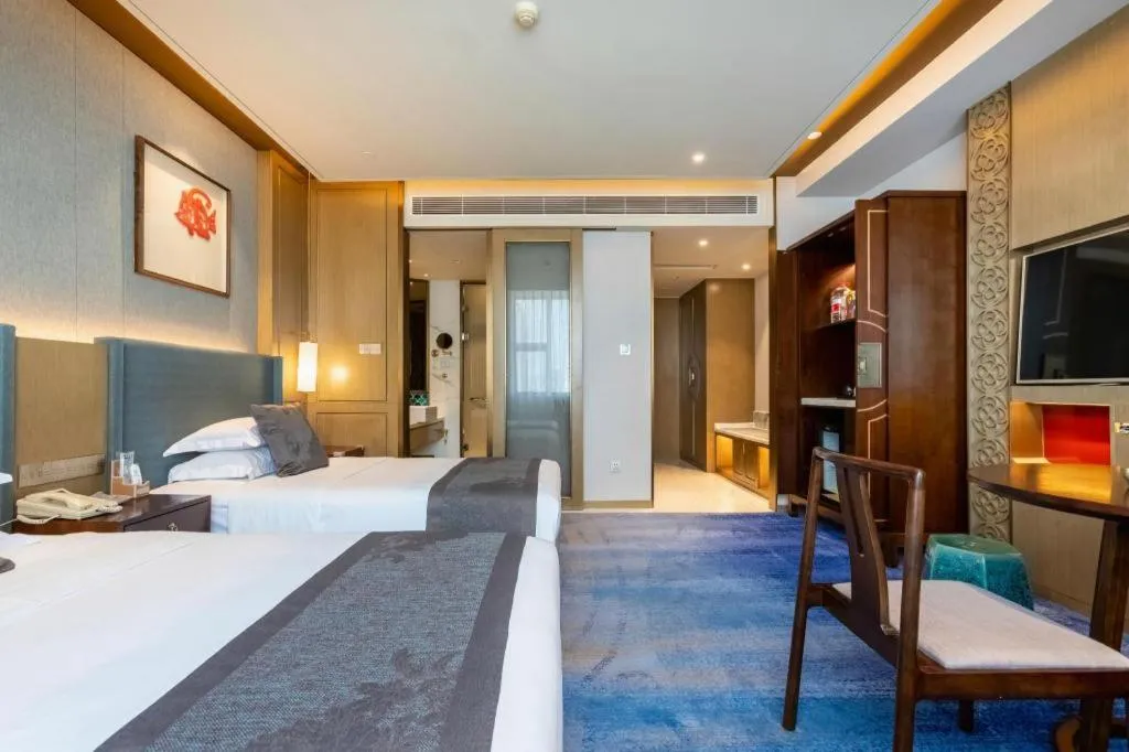 Bed in Bliss International Hotel Weihai
