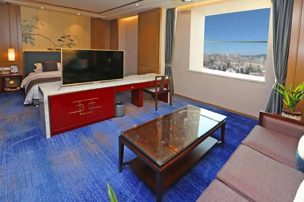 Bed in Bliss International Hotel Weihai