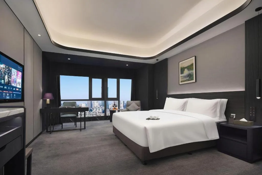 Bed in Changsha Jasmine International Hotel