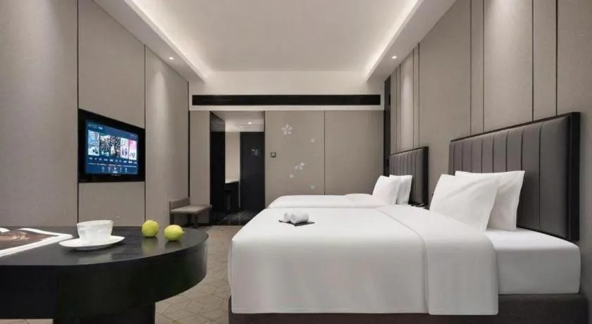 Bed in Changsha Jasmine International Hotel