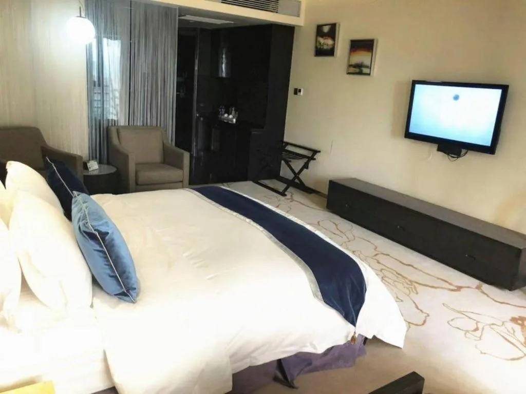 Bed in Changsha Jasmine International Hotel