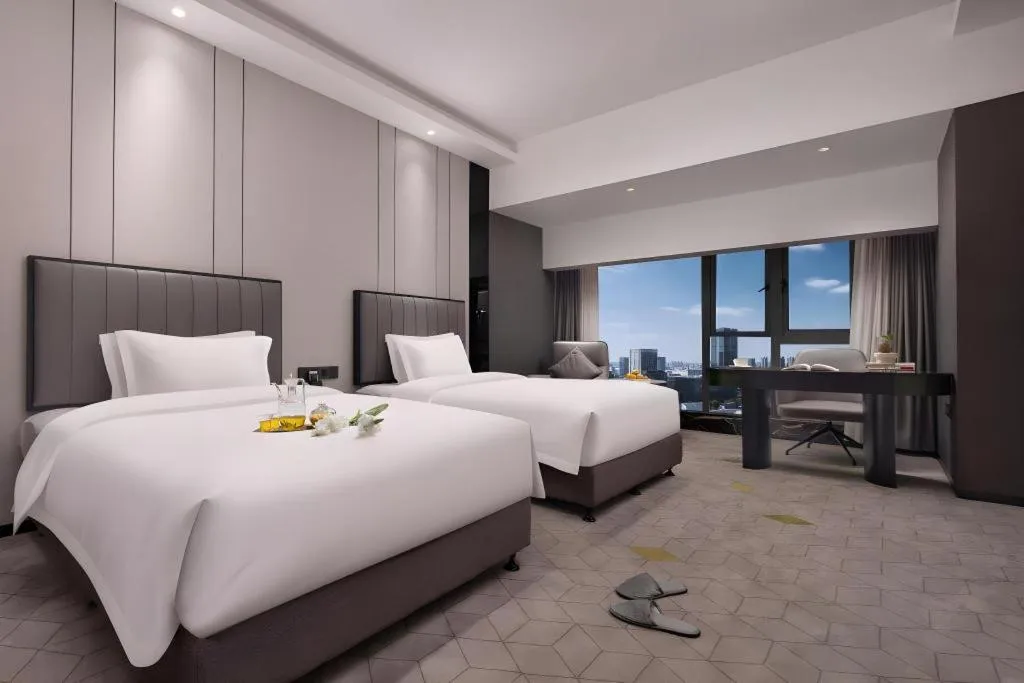 Bed in Changsha Jasmine International Hotel