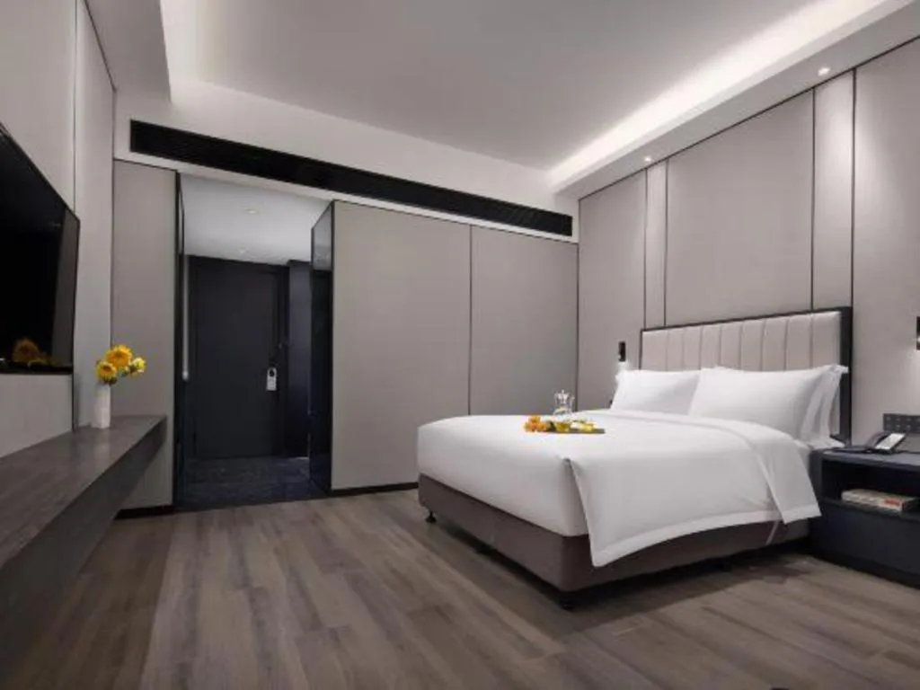 Bed in Changsha Jasmine International Hotel