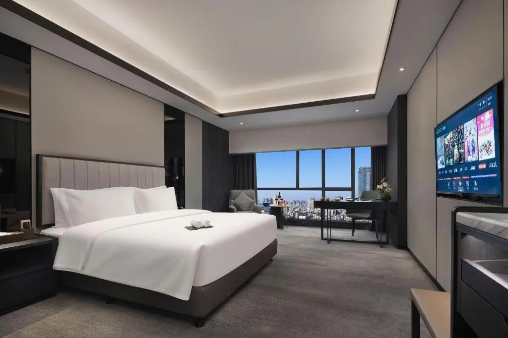 Bed in Changsha Jasmine International Hotel