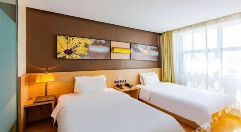 Bed in IU Hotel Tianjin Tianta Scenic Spot Wujiayao Metro Station