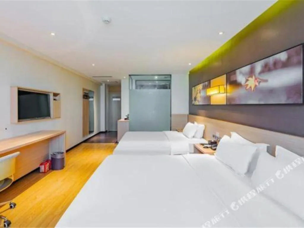 Bed in IU Hotel Tianjin Tianta Scenic Spot Wujiayao Metro Station