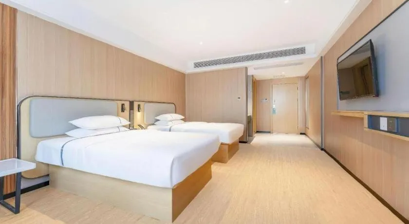 Bed in City Comfort Inn Guangzhou Jiaokou Metro Station