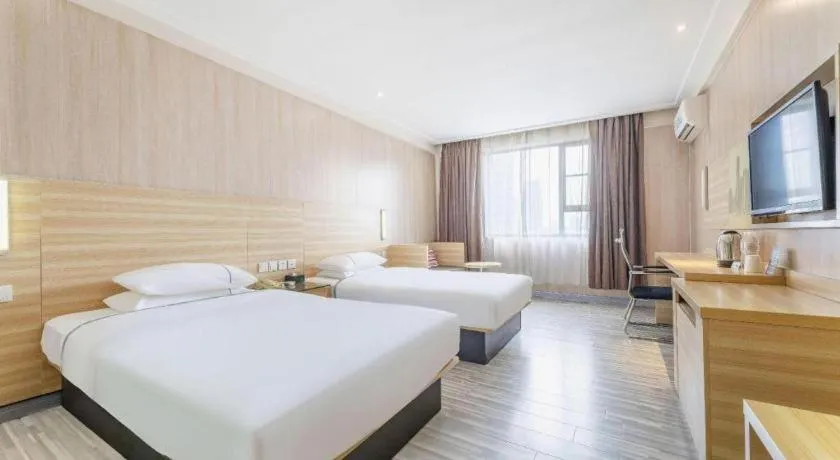 Bed in City Comfort Inn Guangzhou Jiaokou Metro Station