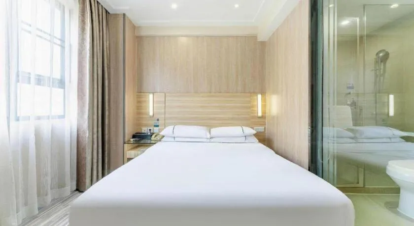 Bed in City Comfort Inn Guangzhou Jiaokou Metro Station