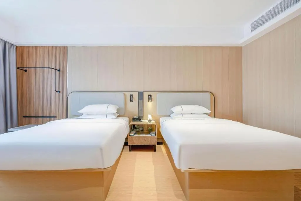 Bed in City Comfort Inn Guangzhou Jiaokou Metro Station