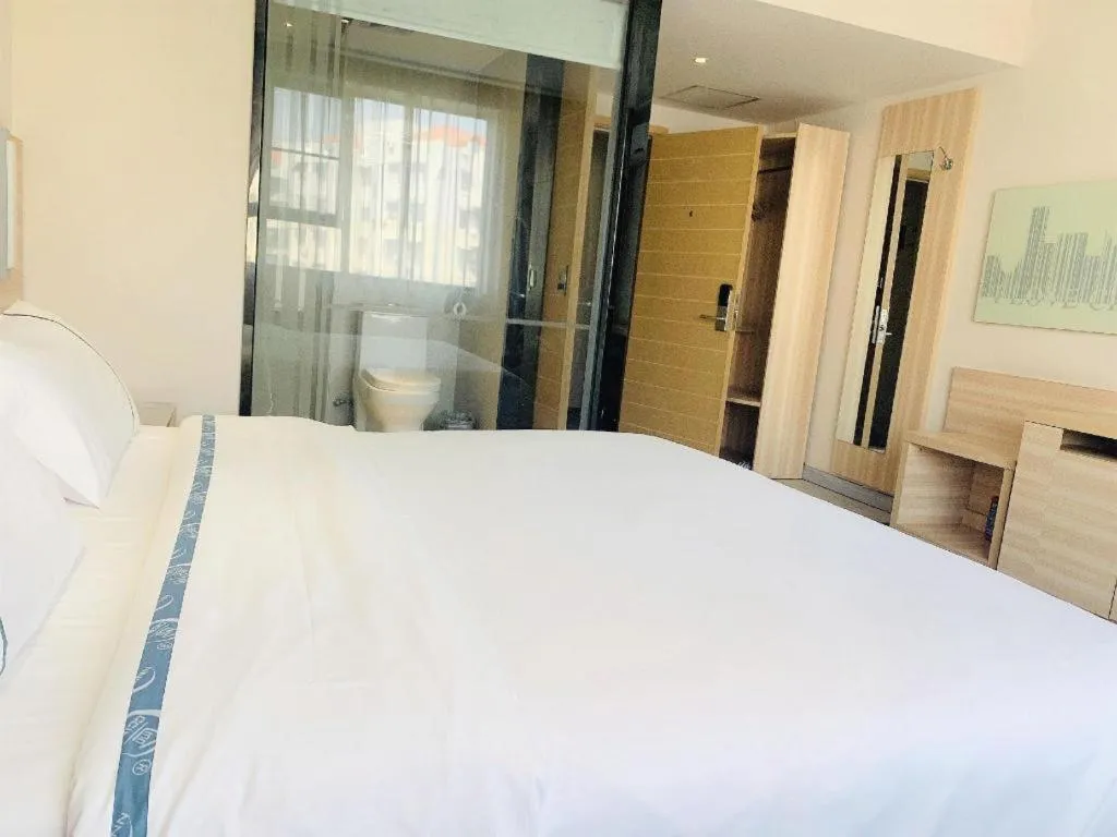 Bed in City Comfort Inn Guangzhou Jiaokou Metro Station