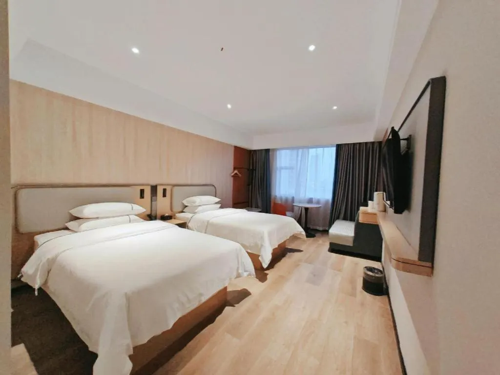 Bed in City Comfort Inn Guangzhou Jiaokou Metro Station