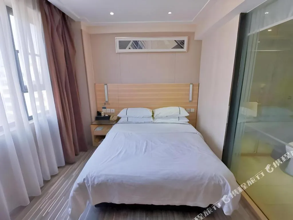 Bed in City Comfort Inn Guangzhou Jiaokou Metro Station