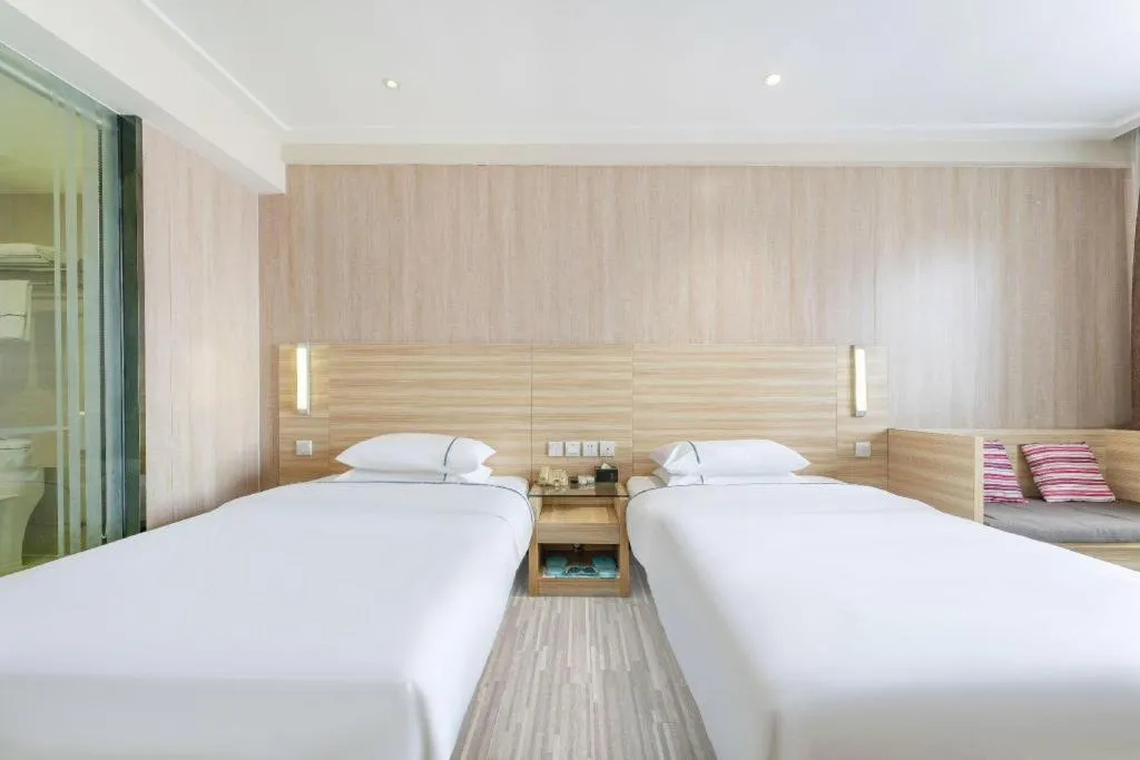 Bed in City Comfort Inn Guangzhou Jiaokou Metro Station