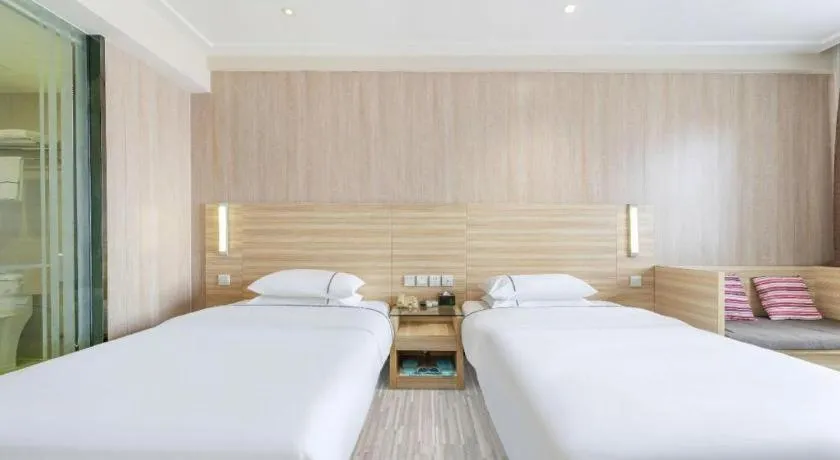 Bed in City Comfort Inn Guangzhou Jiaokou Metro Station