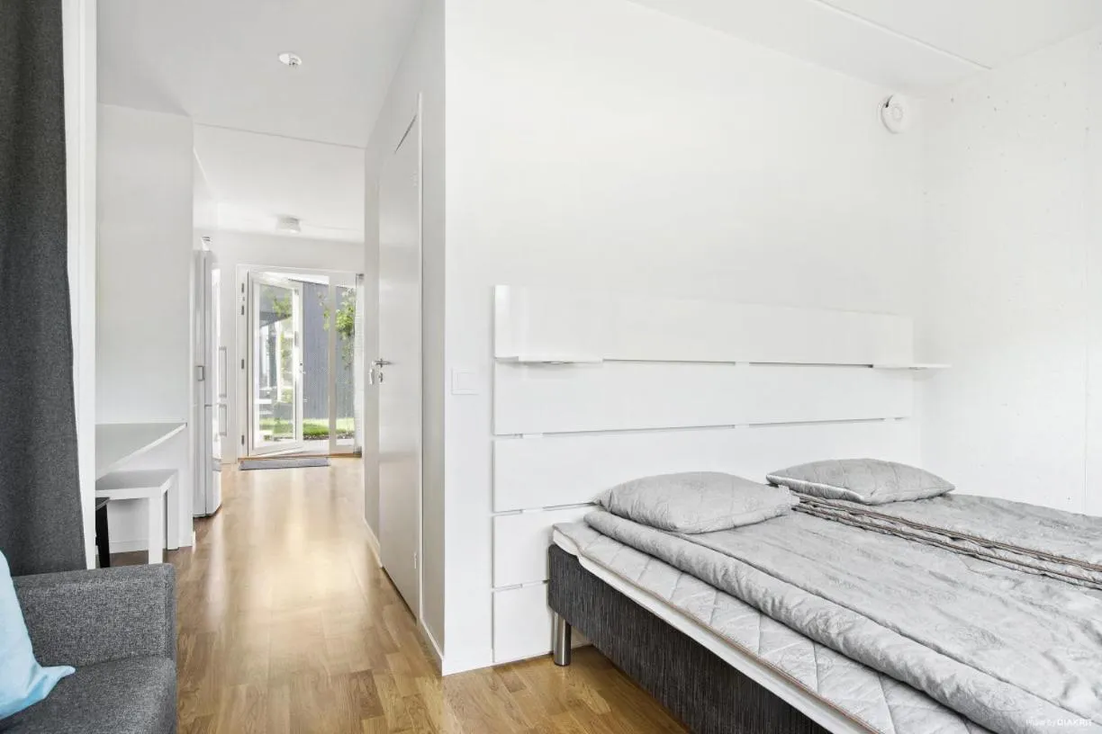 Bedroom, Bed in Kolgården - Visby Lägenhetshotell