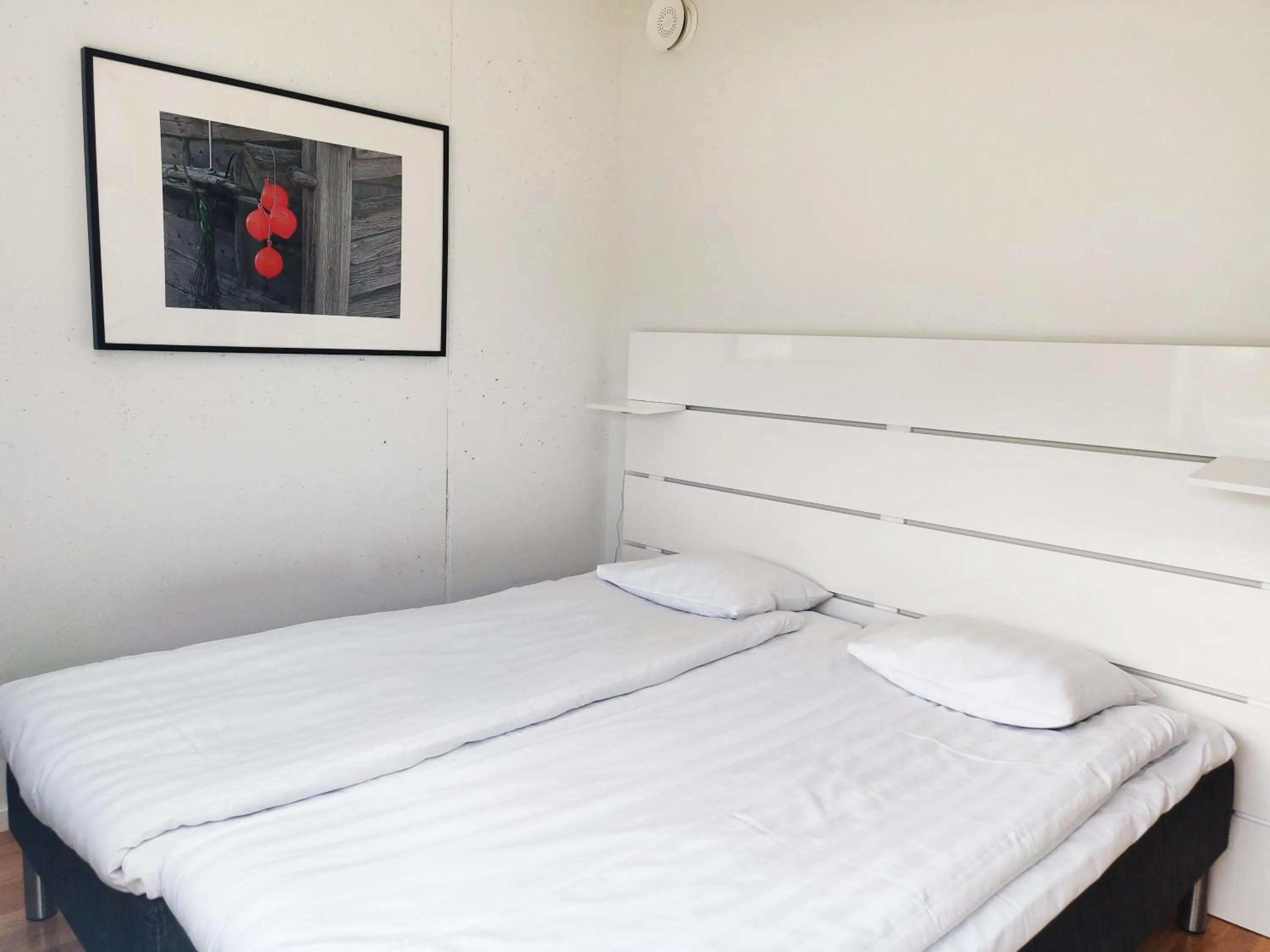 Bed in Kolgården - Visby Lägenhetshotell