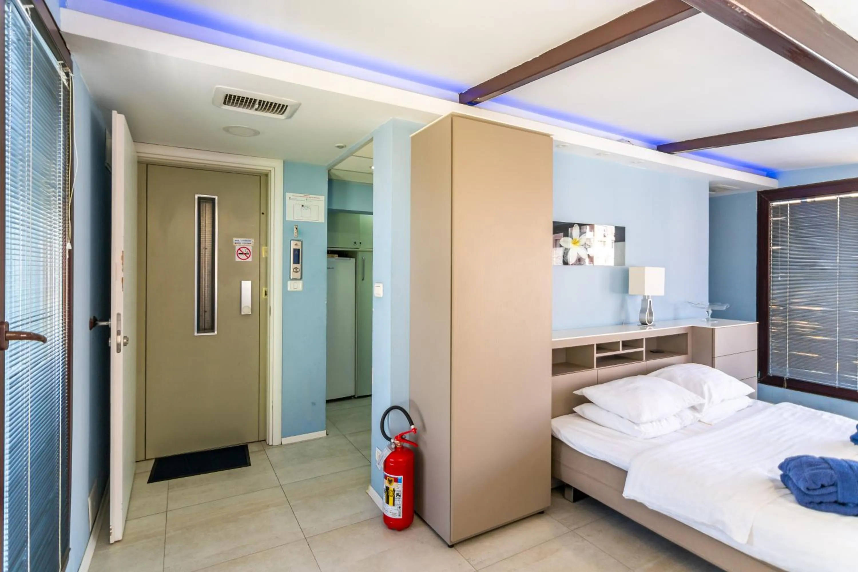 Bed in Joan Apartments & Spa