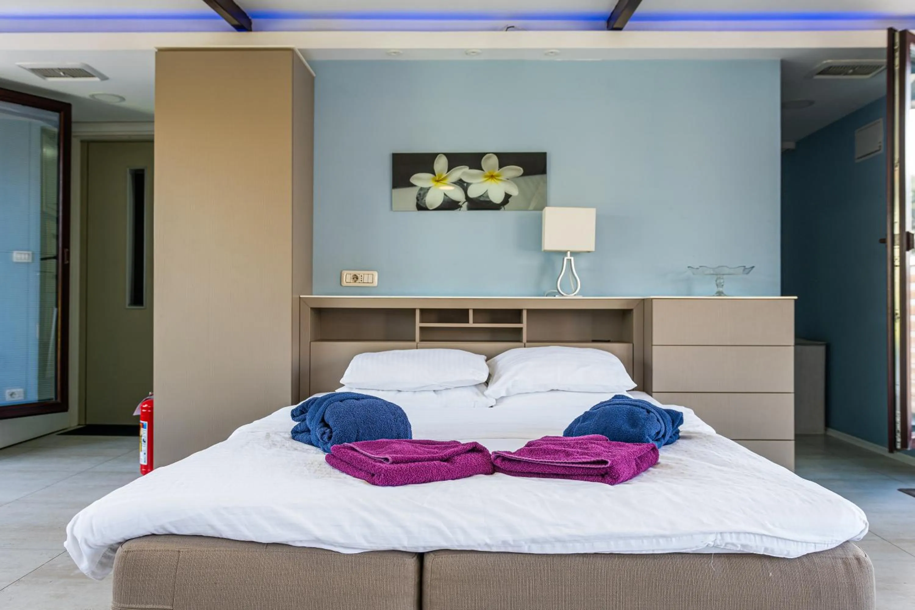 Bed in Joan Apartments & Spa