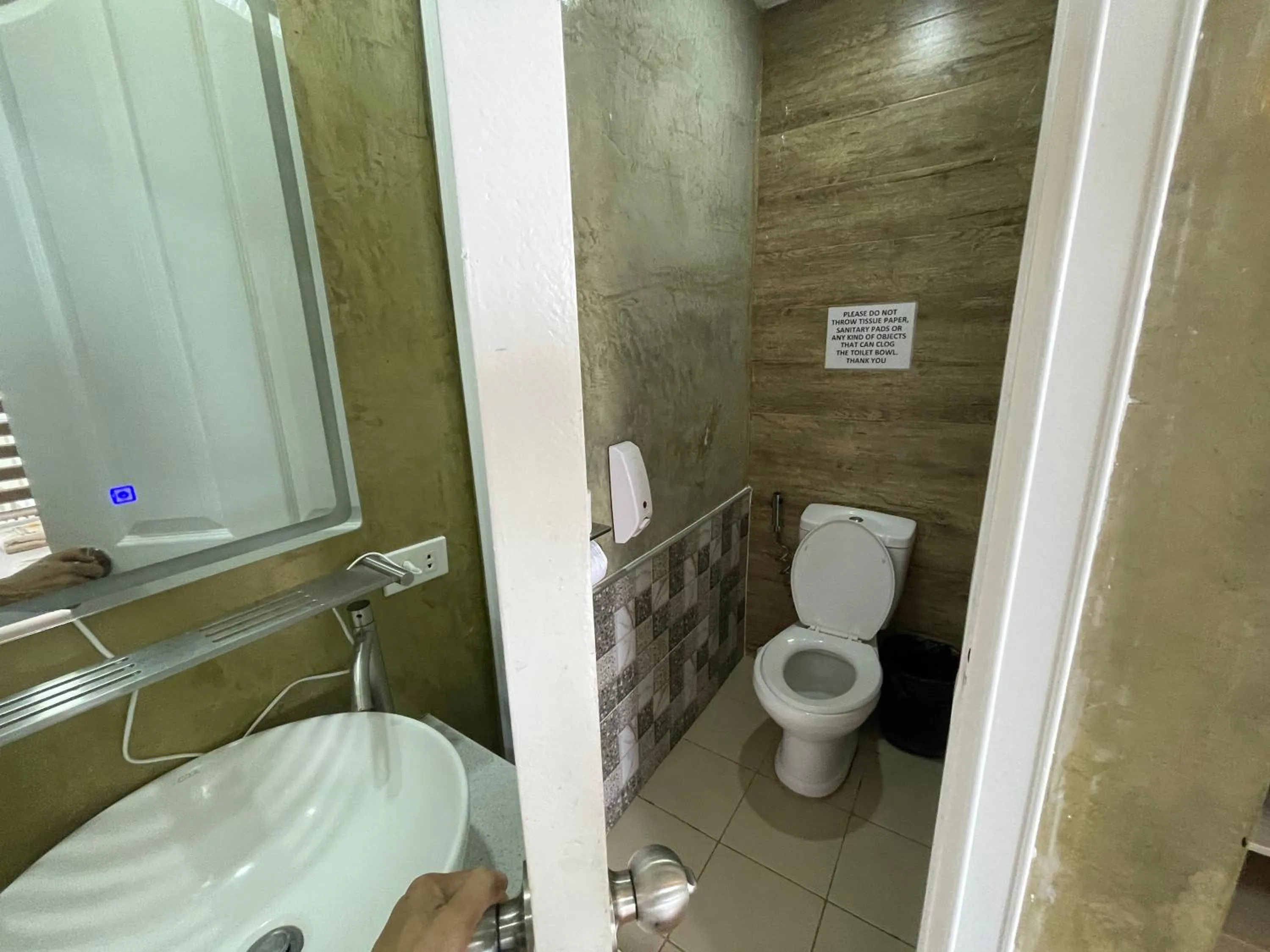 Bathroom in Serenity Farm and Resort by Hiverooms