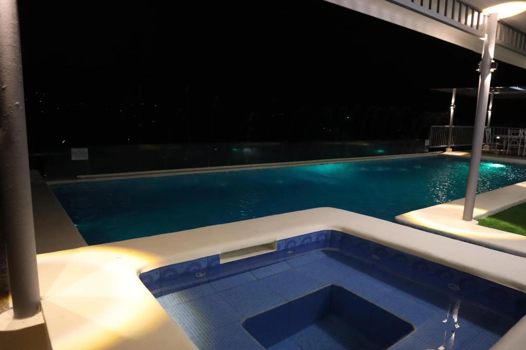 Pool view in Serenity Farm and Resort by Hiverooms