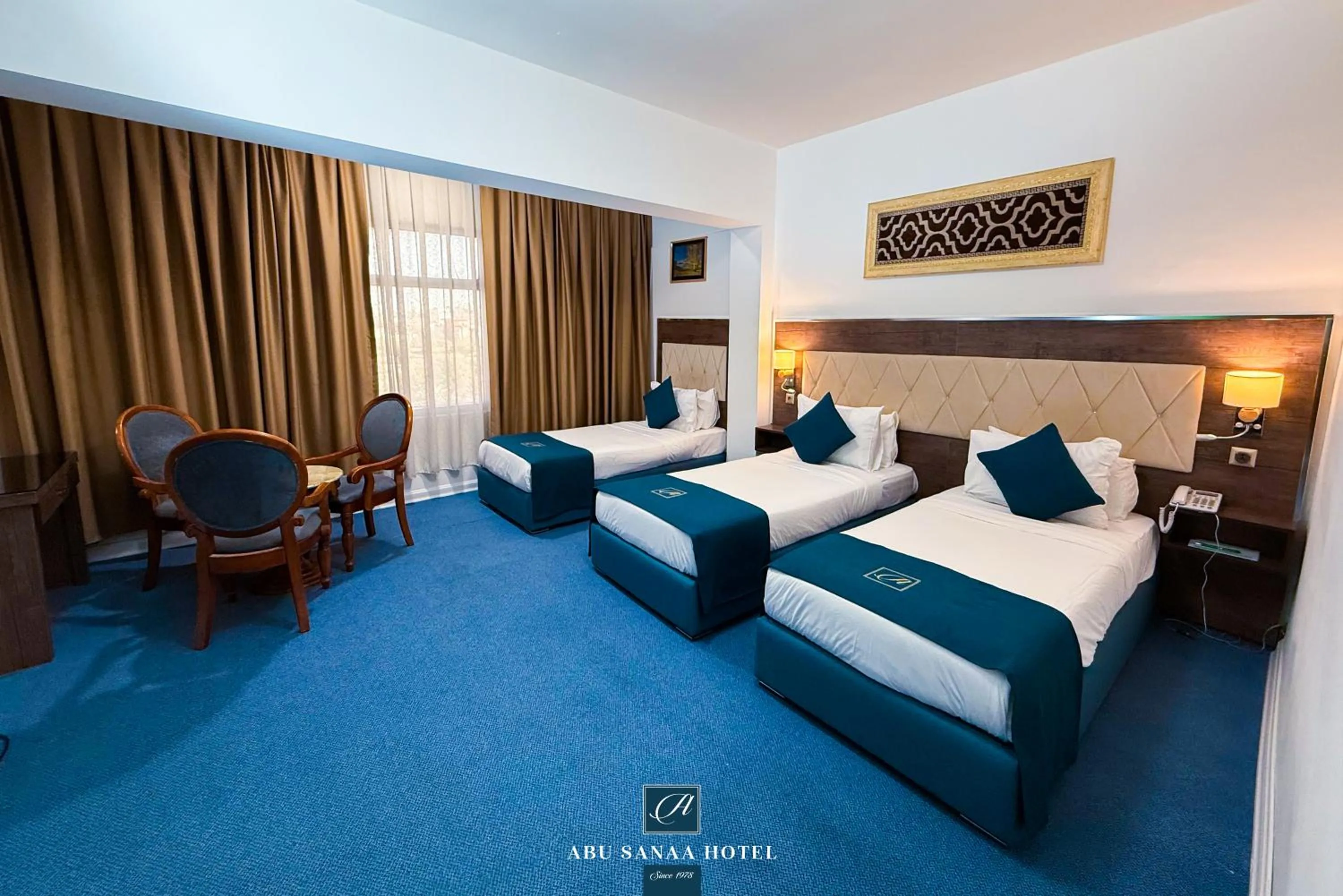 Bed in Abu Sanaa Hotel