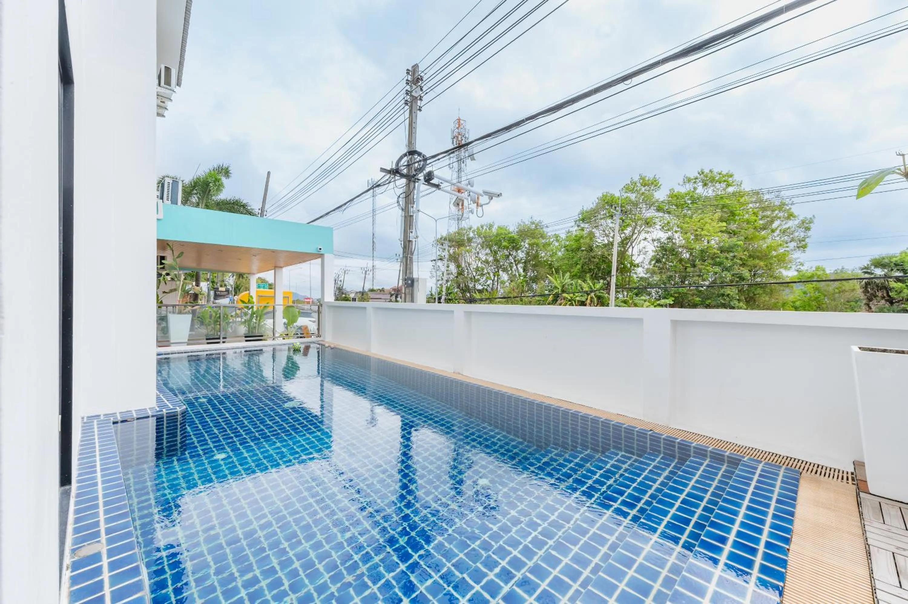 Swimming pool in De Blue Sea Rawai Hotel