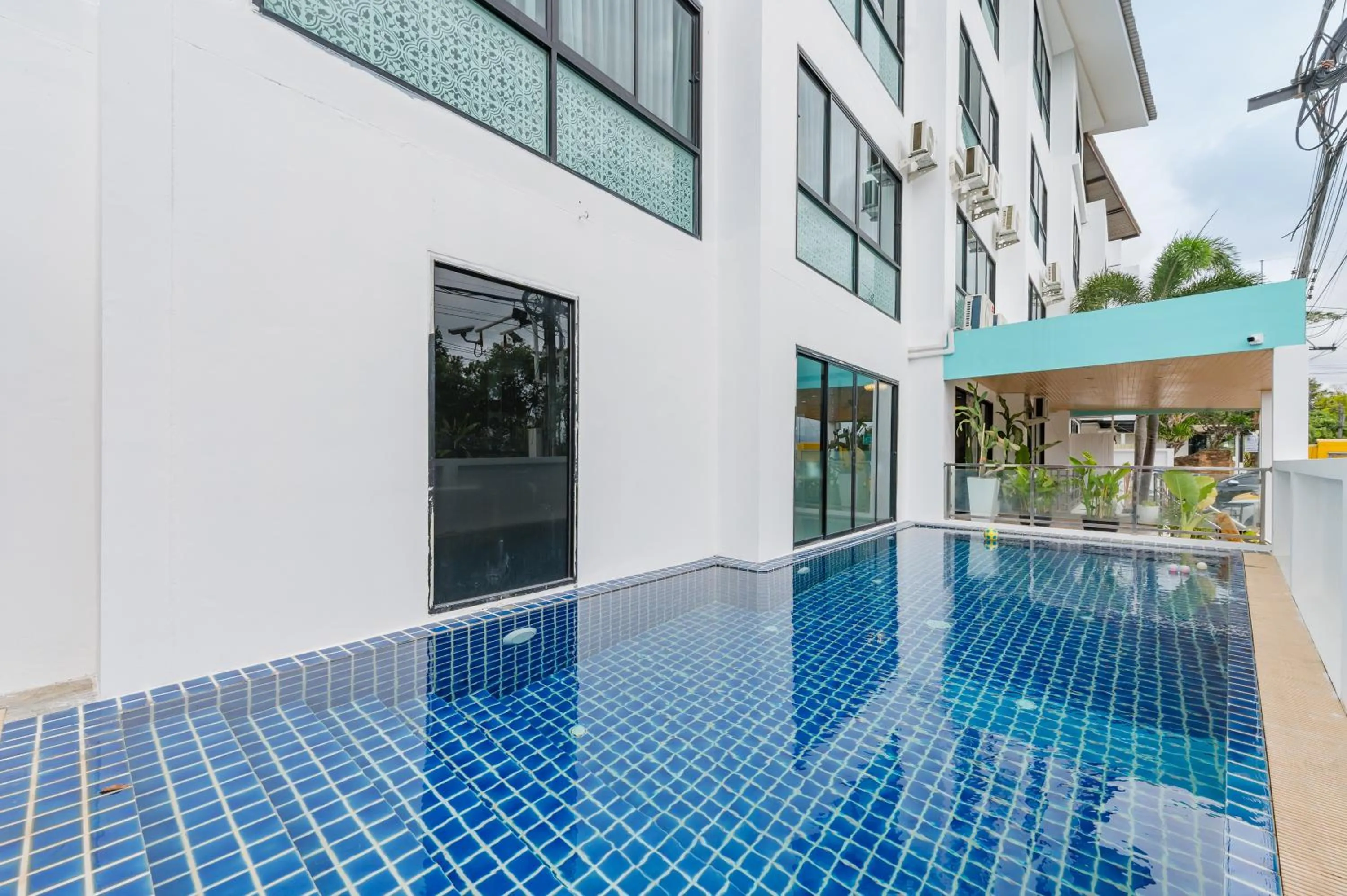 Swimming pool in De Blue Sea Rawai Hotel