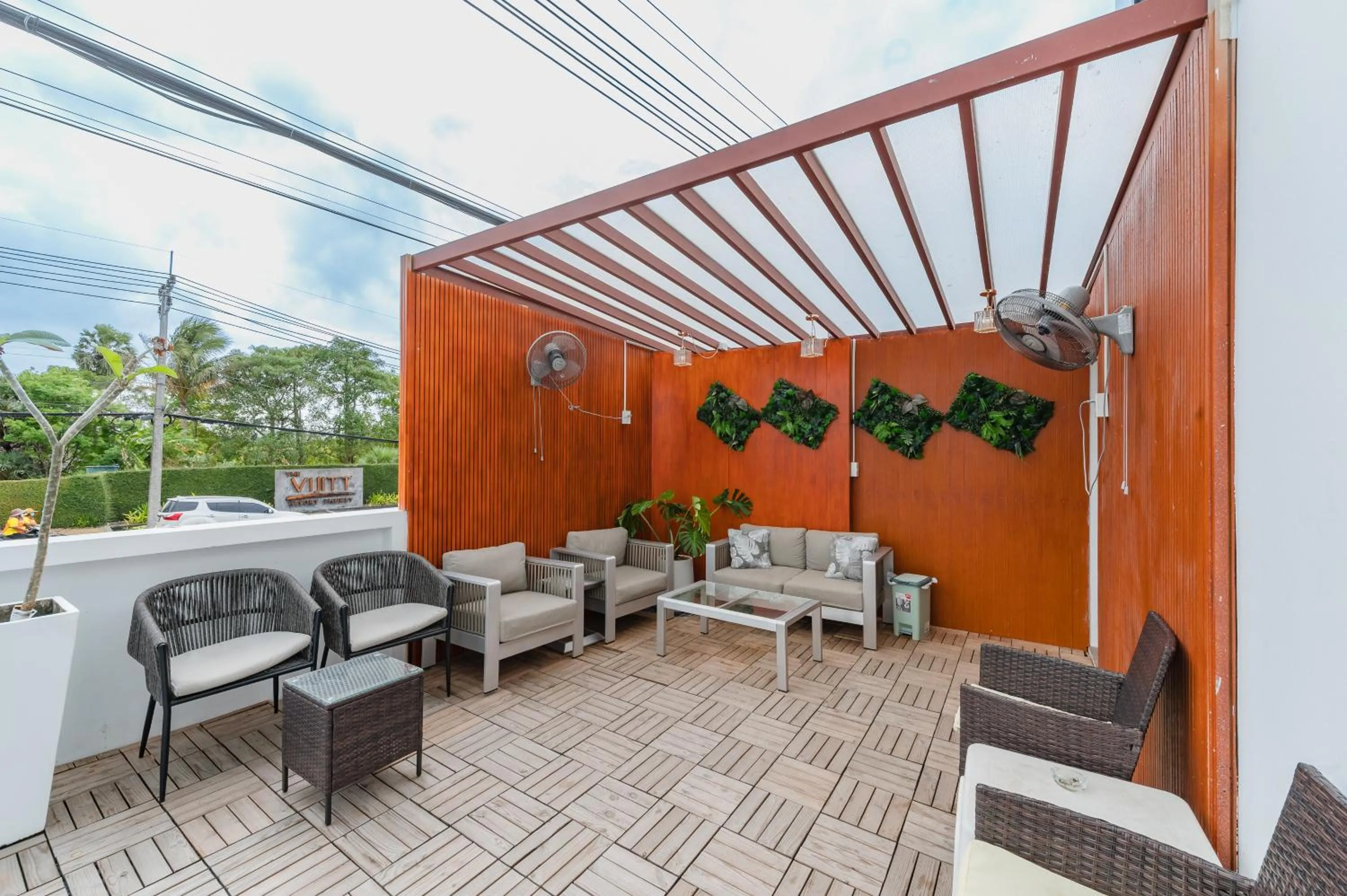 Seating area in De Blue Sea Rawai Hotel