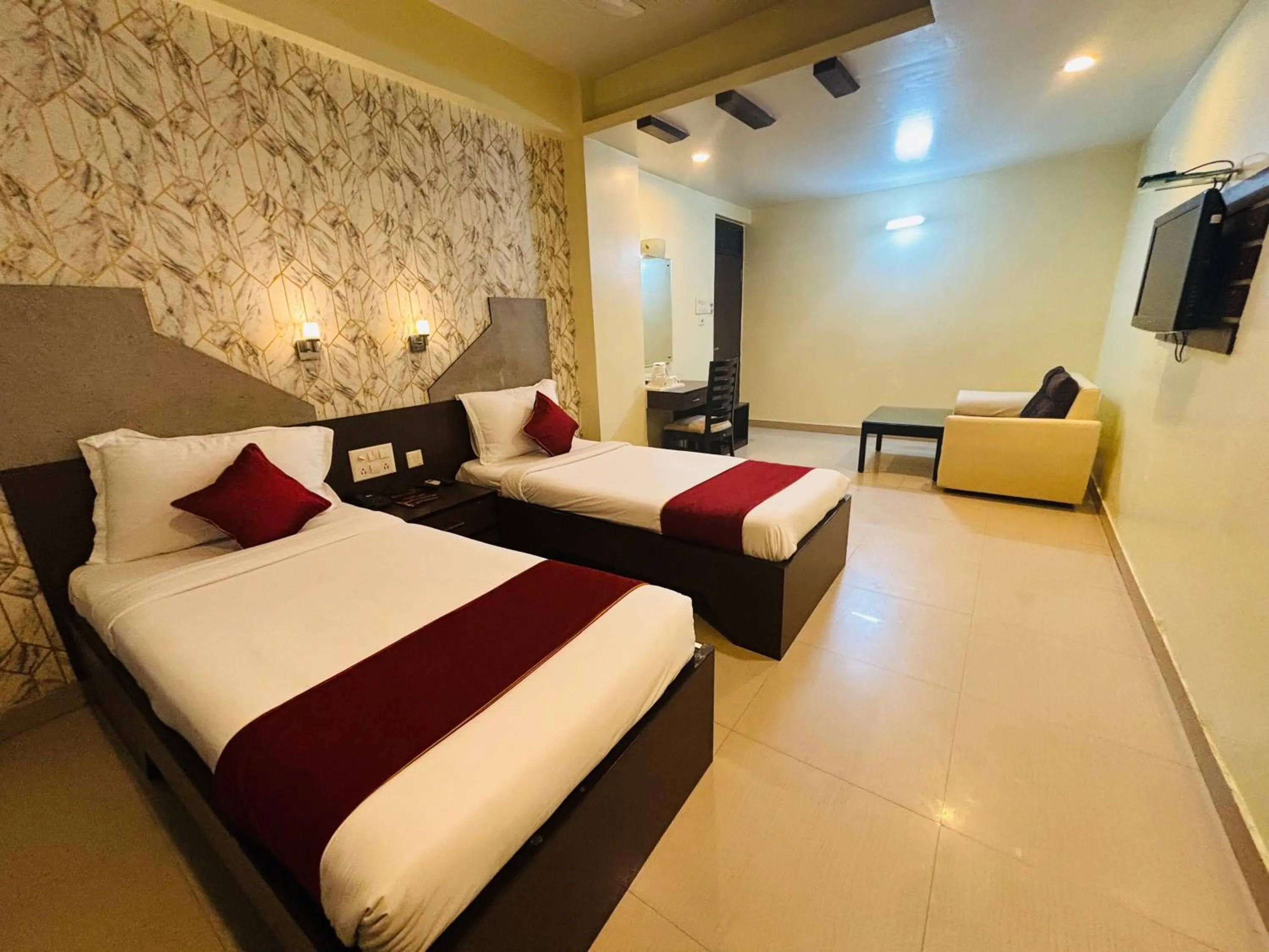 Photo of the whole room, Bed in Hotel Chariot Inn Patna