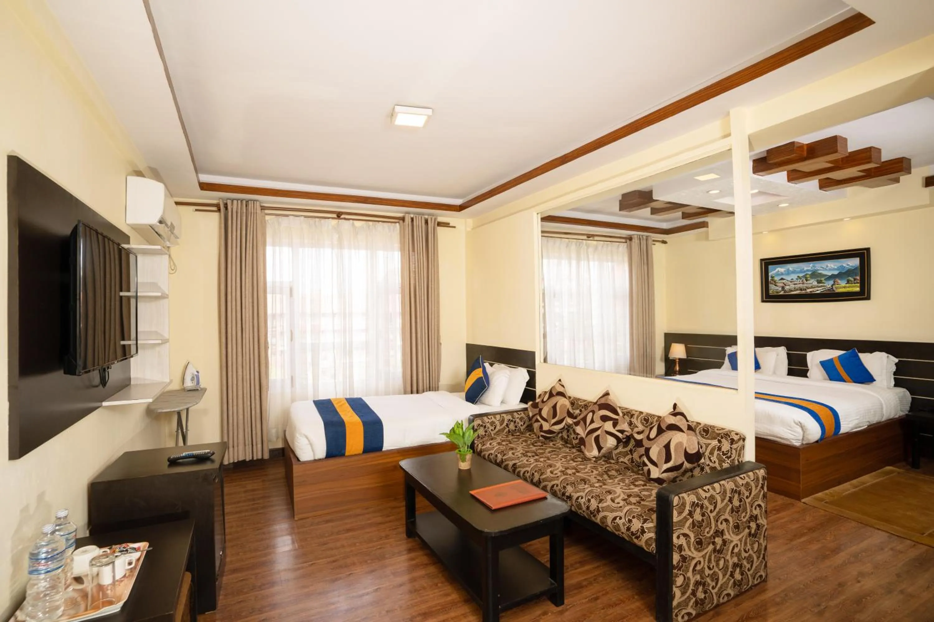 Communal lounge/ TV room, Bed in Norbulinka Boutique Hotel