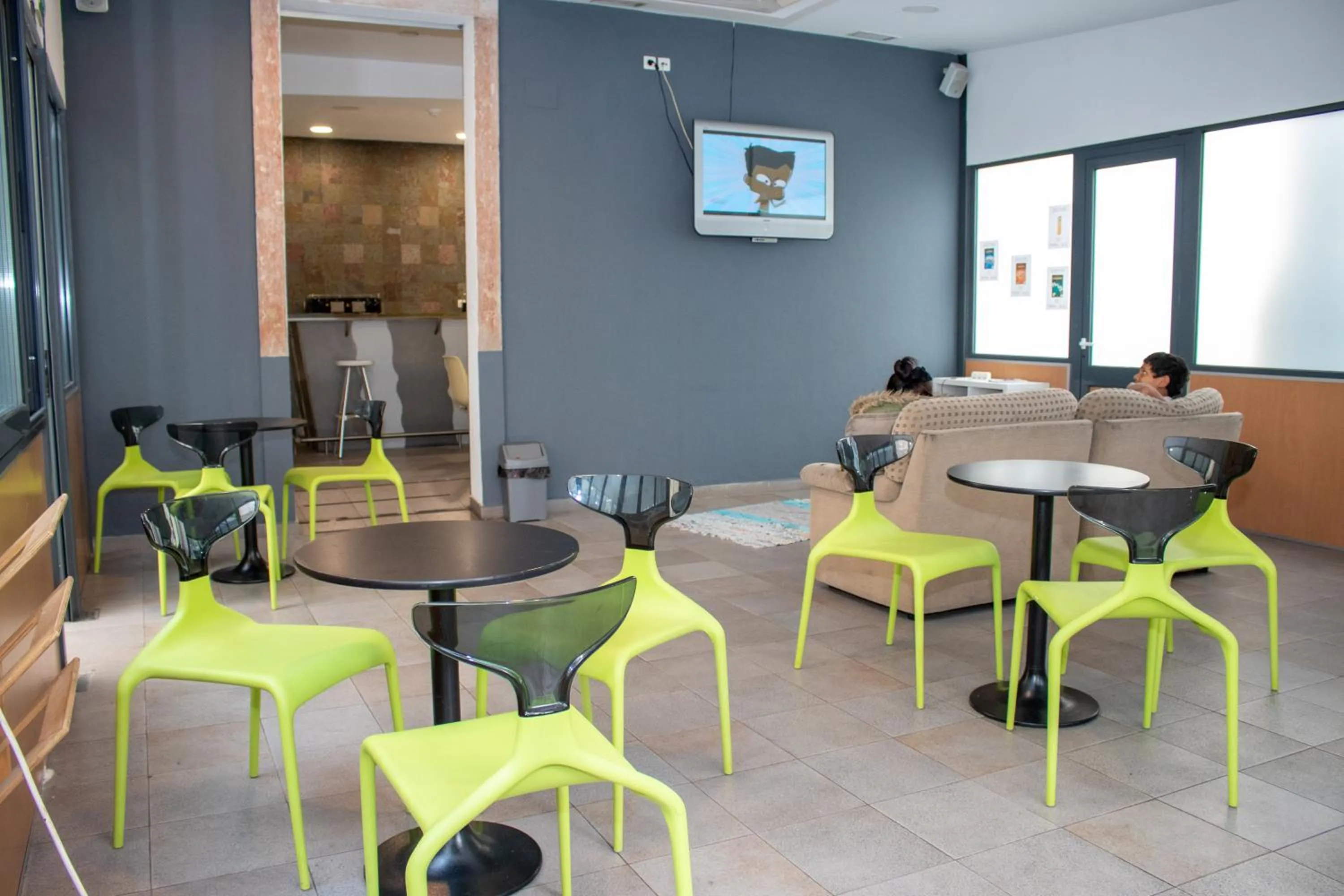 Communal lounge/ TV room in HI Lisboa - Pousada de Juventude