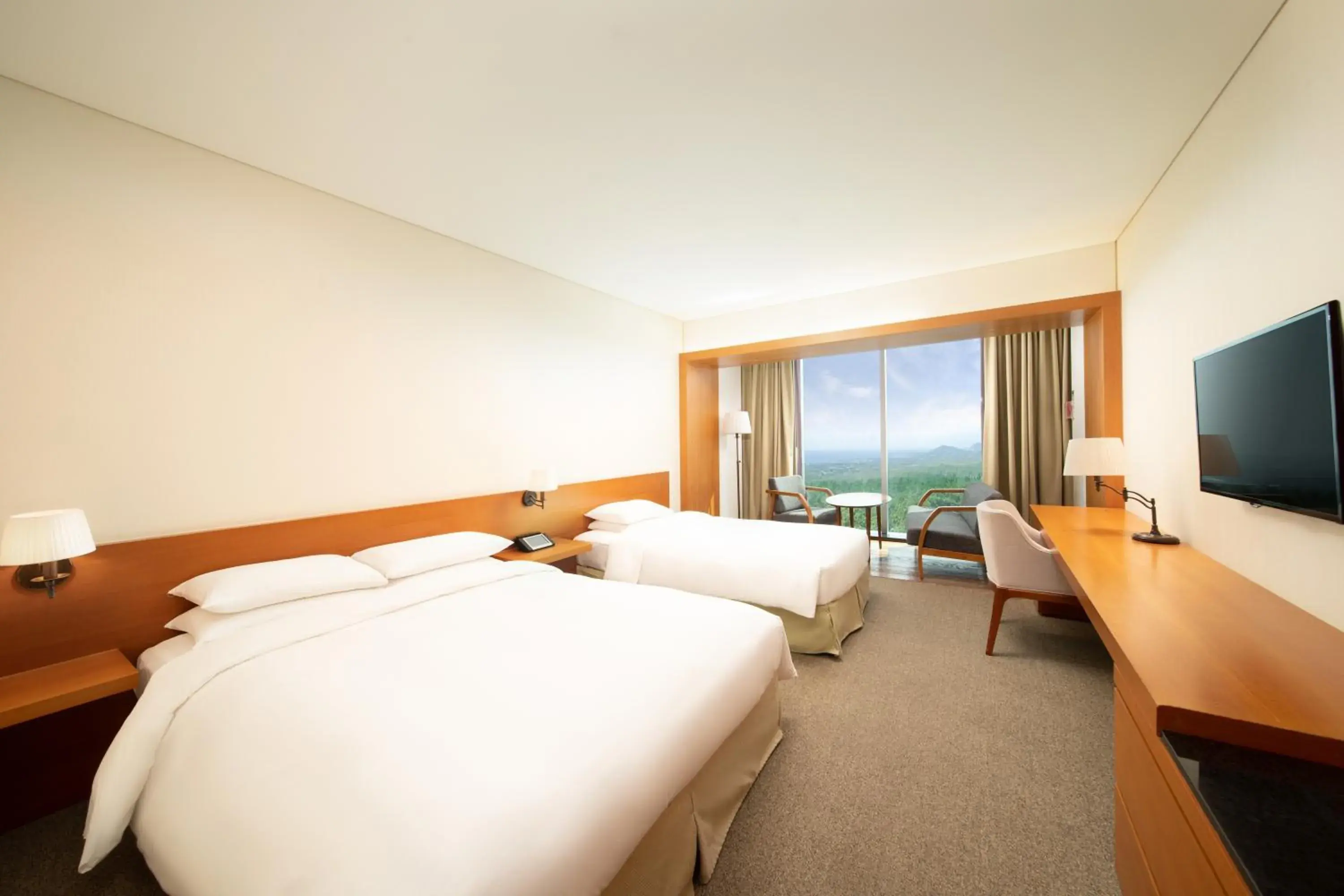 Superior Twin Room with Distant Ocean View in WE Hotel Jeju Superior Twin Room with Distant Ocean View in WE Hotel Jeju