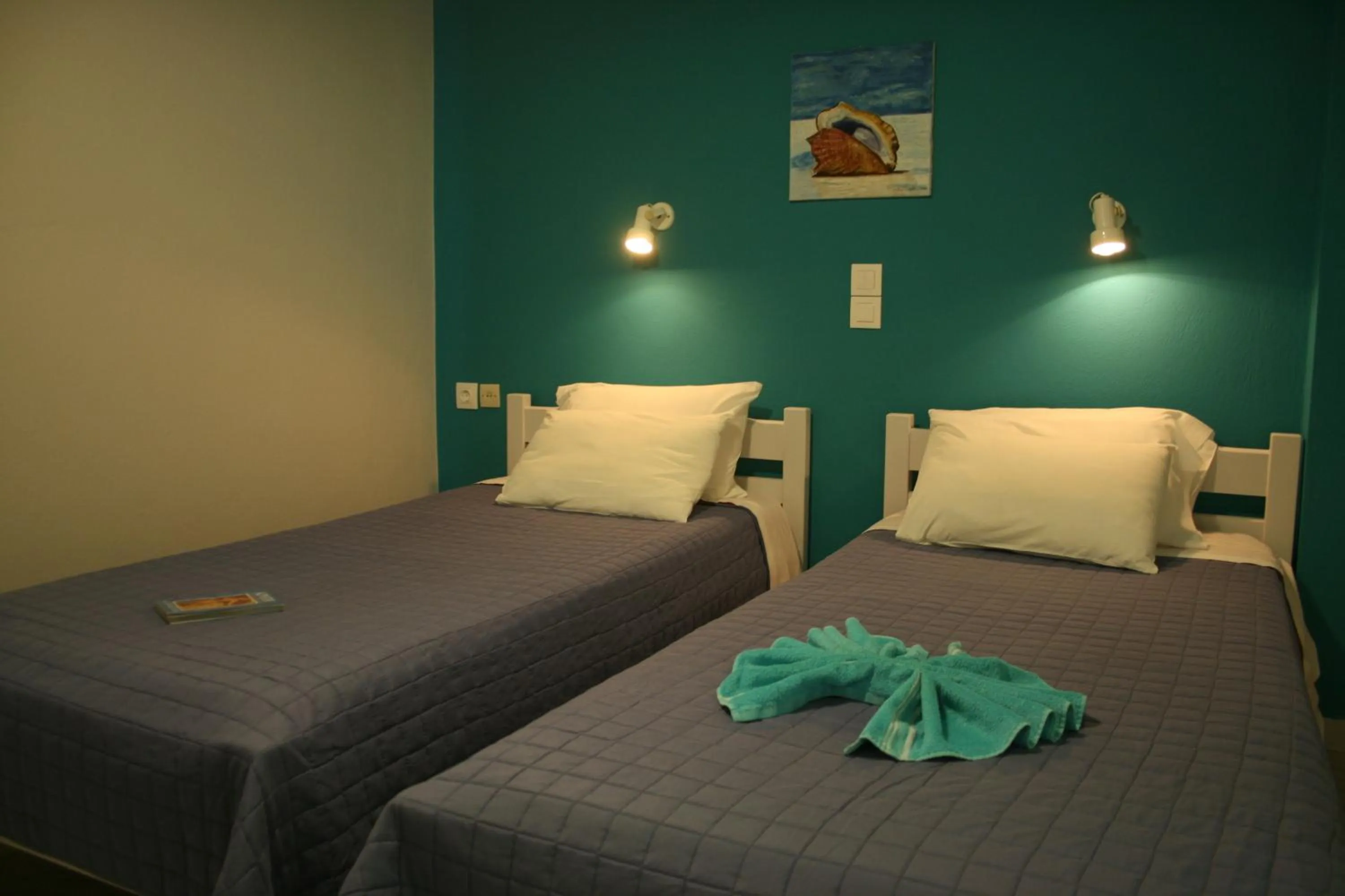 Bed in Nereides Hotel