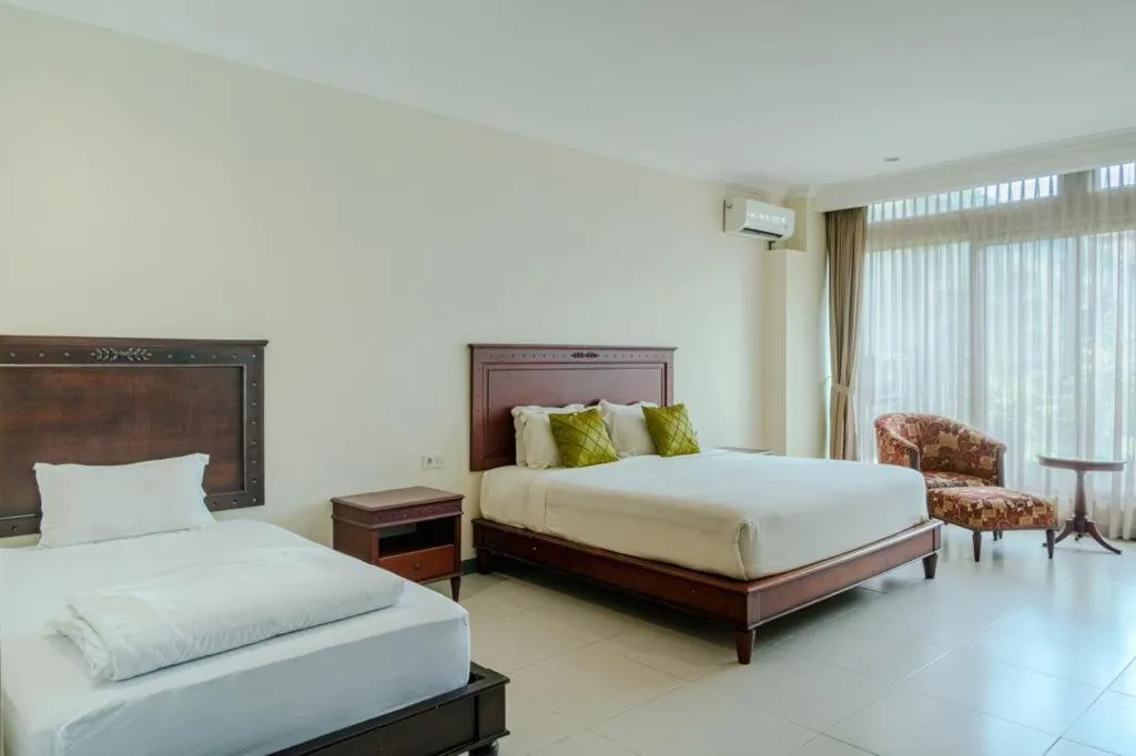 Bed in Maharani Guest House