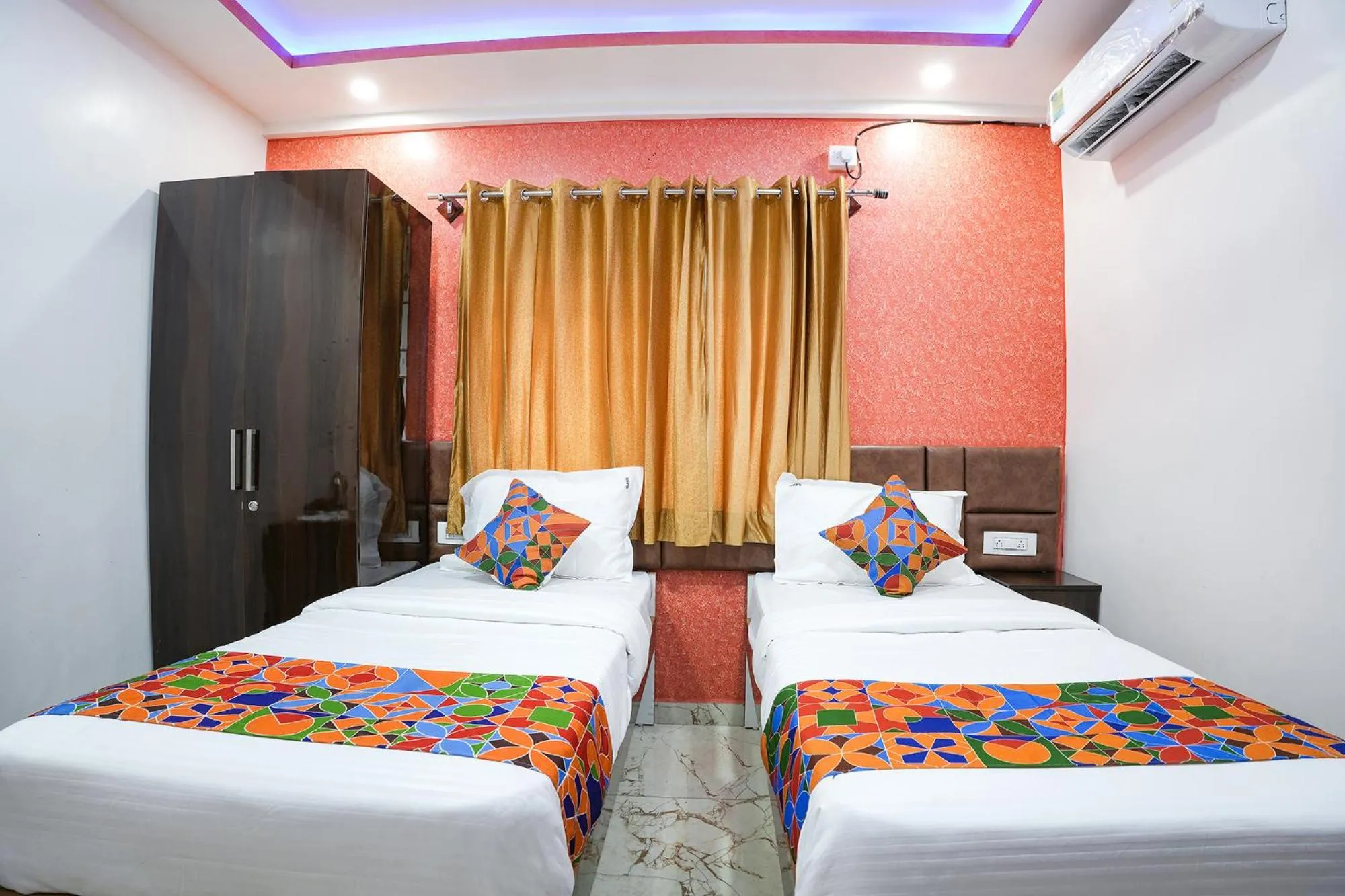 Bed in FabHotel A White Pearl Suites - Yelahanka