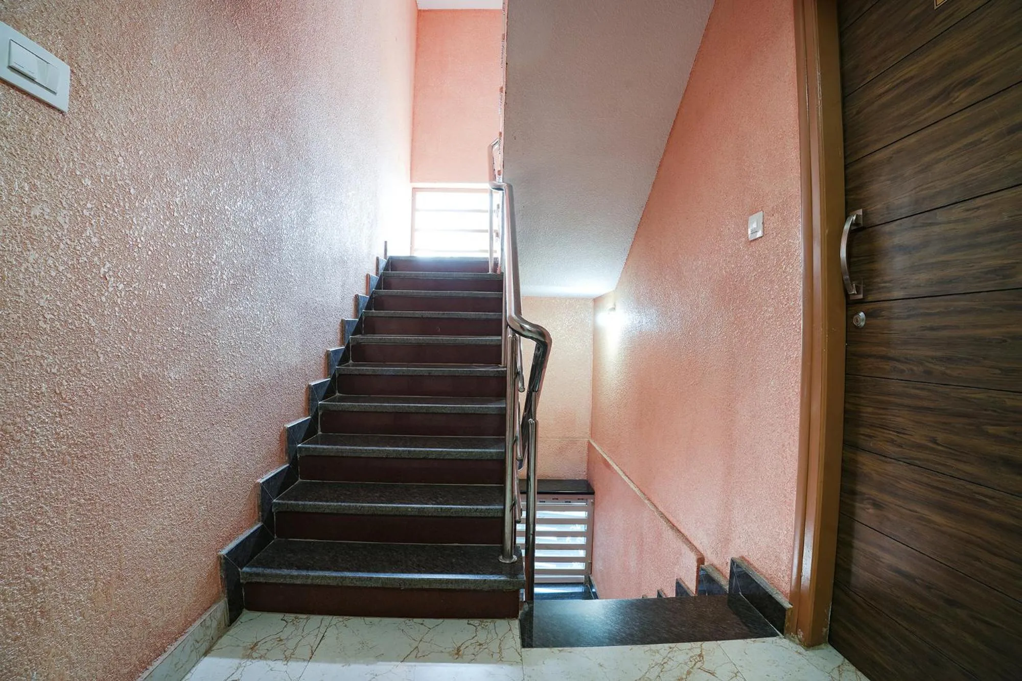 Lobby or reception in FabHotel A White Pearl Suites - Yelahanka