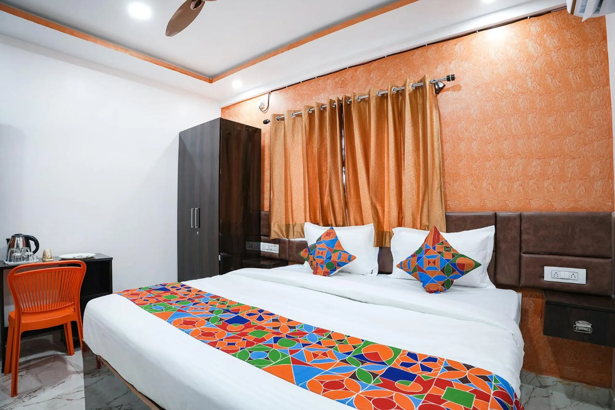 Bed in FabHotel A White Pearl Suites - Yelahanka