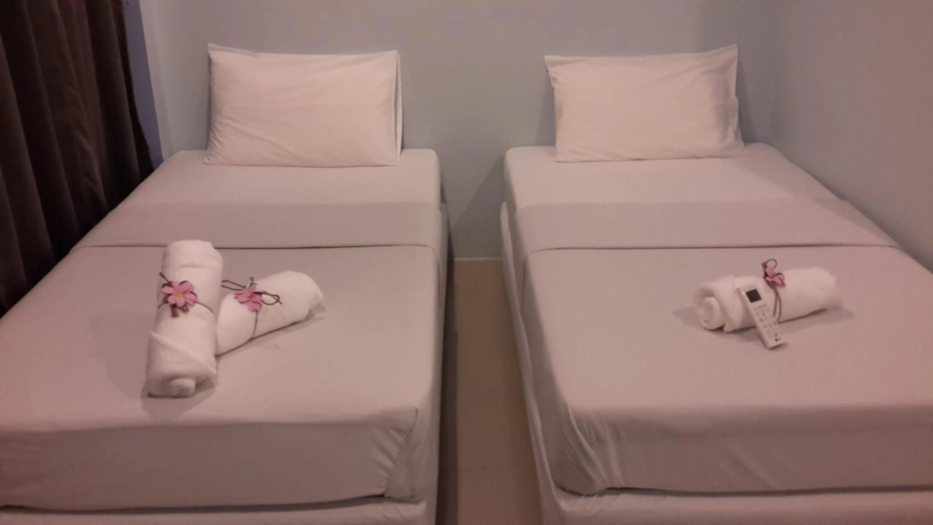 Bed in Hotel Rung Phangan