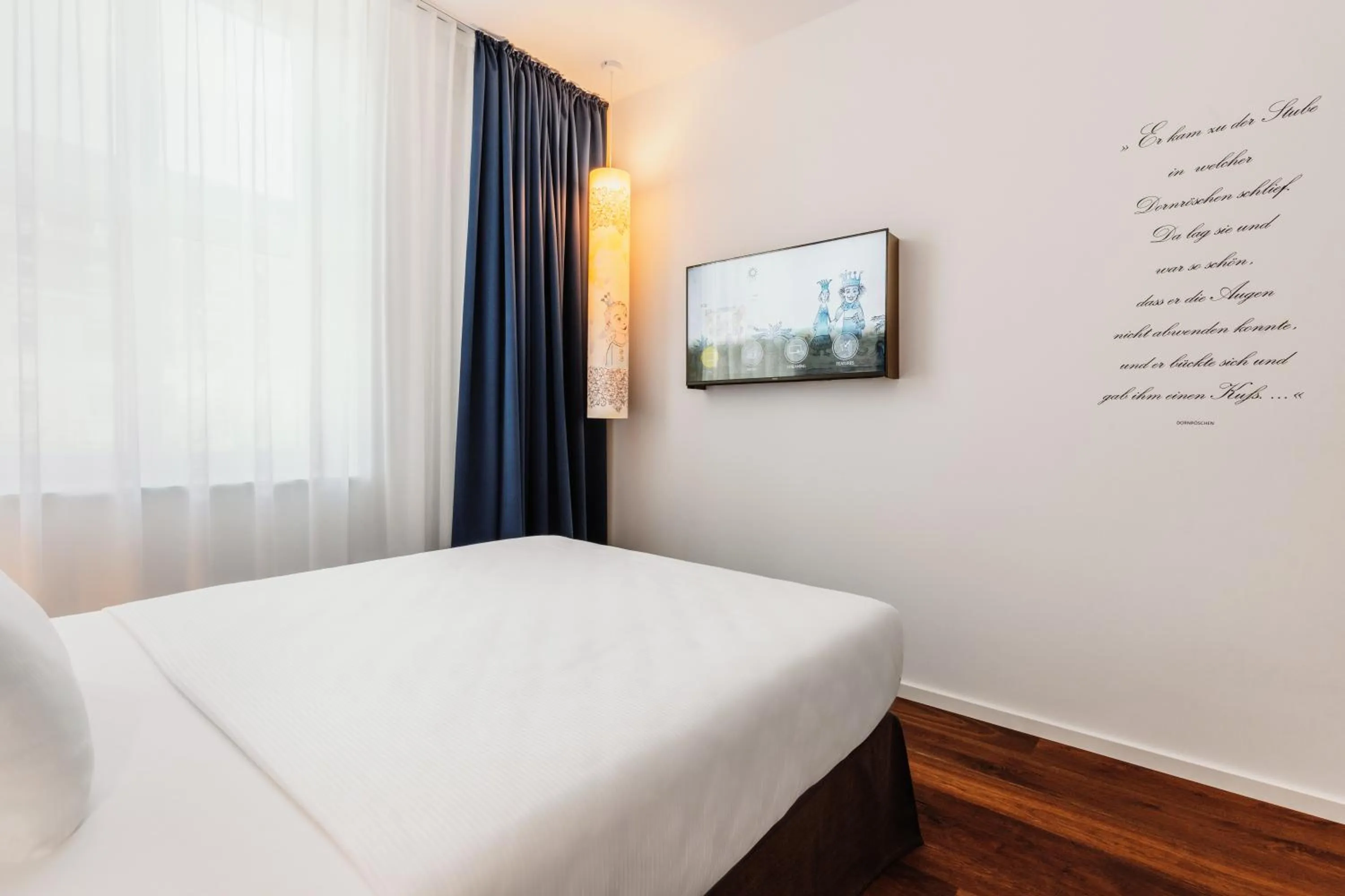 Bed in Grimms Hotel Hanau