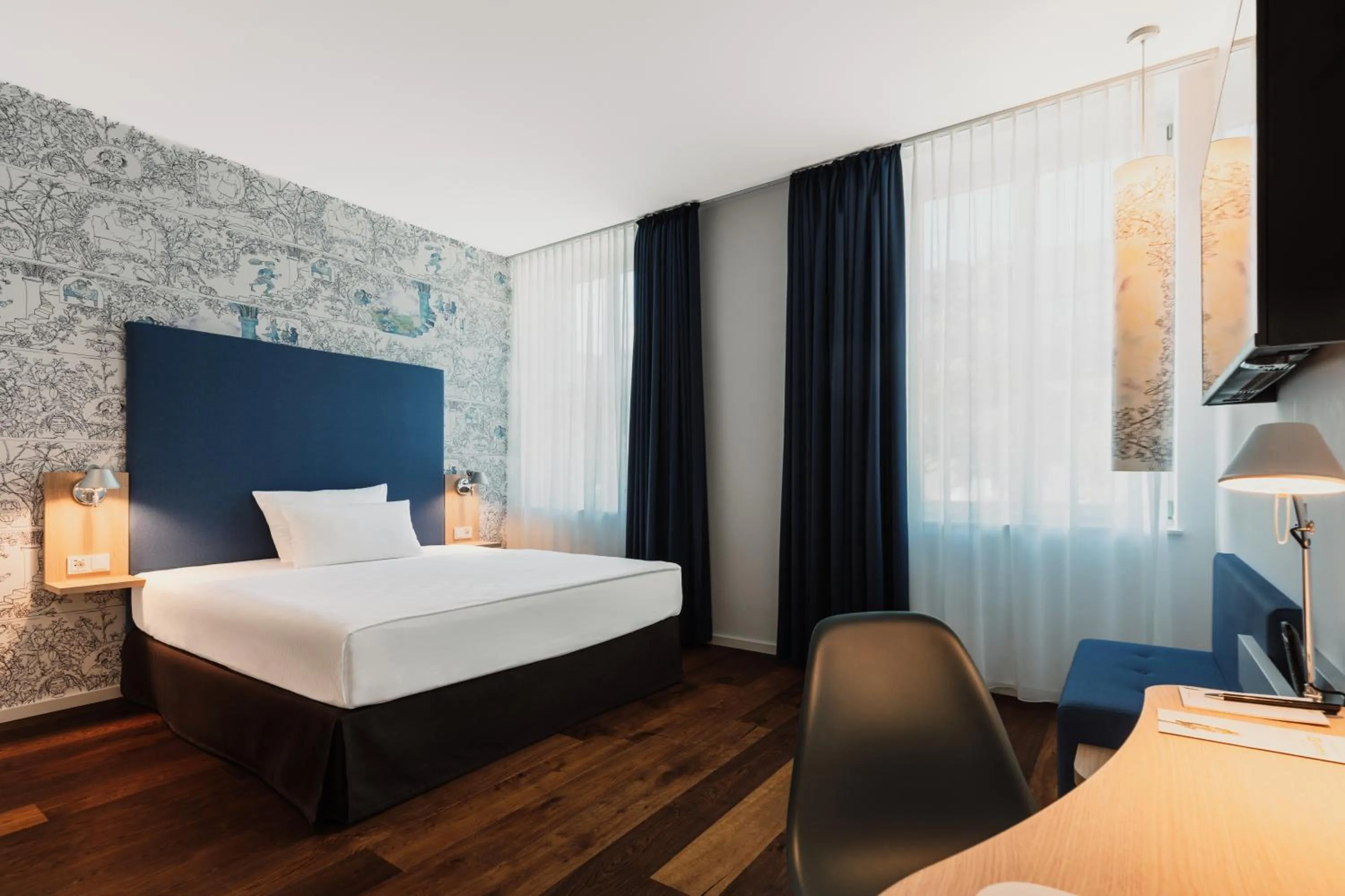 Bed in Grimms Hotel Hanau