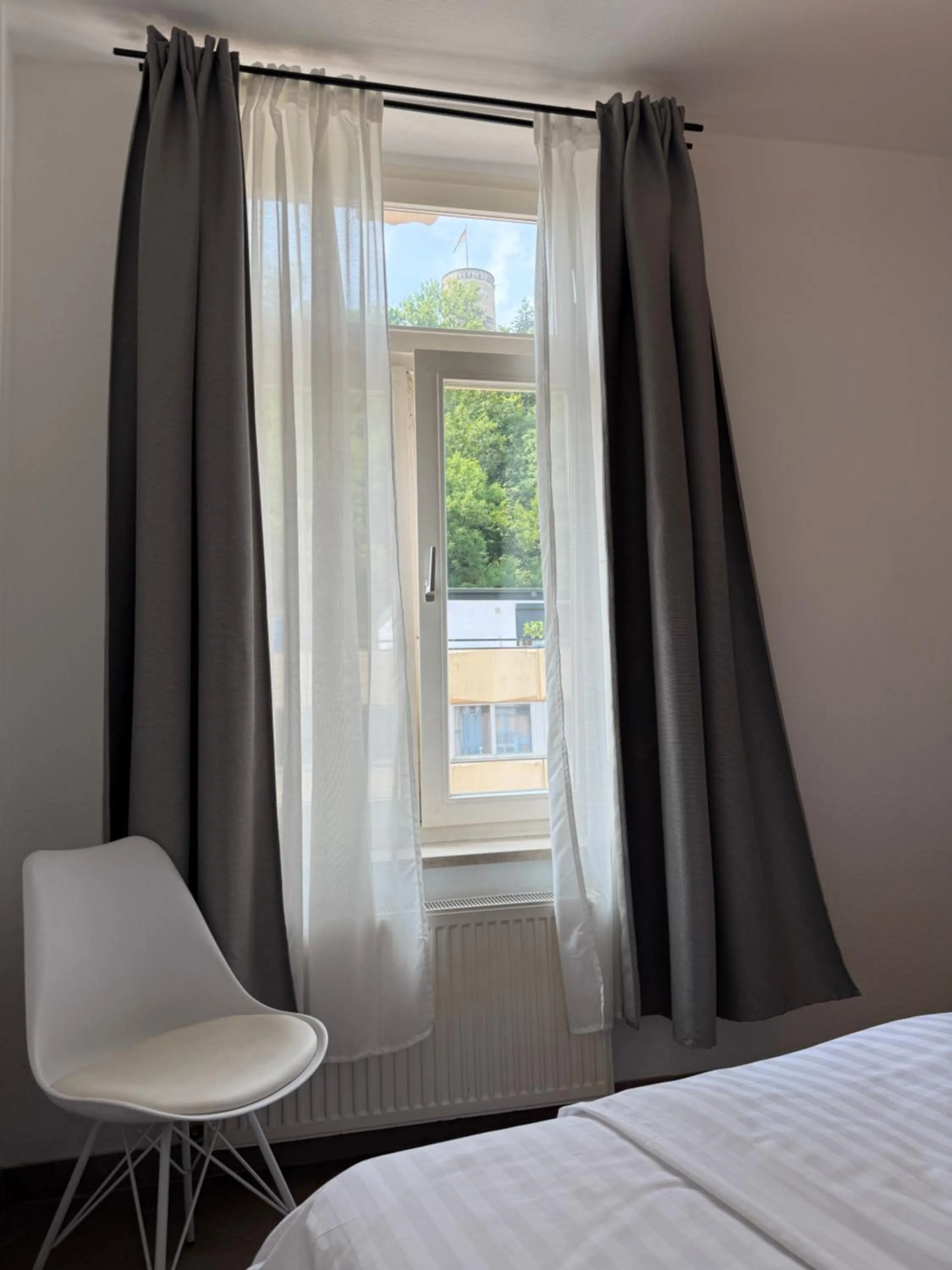 Bed in FHS ApartHotel