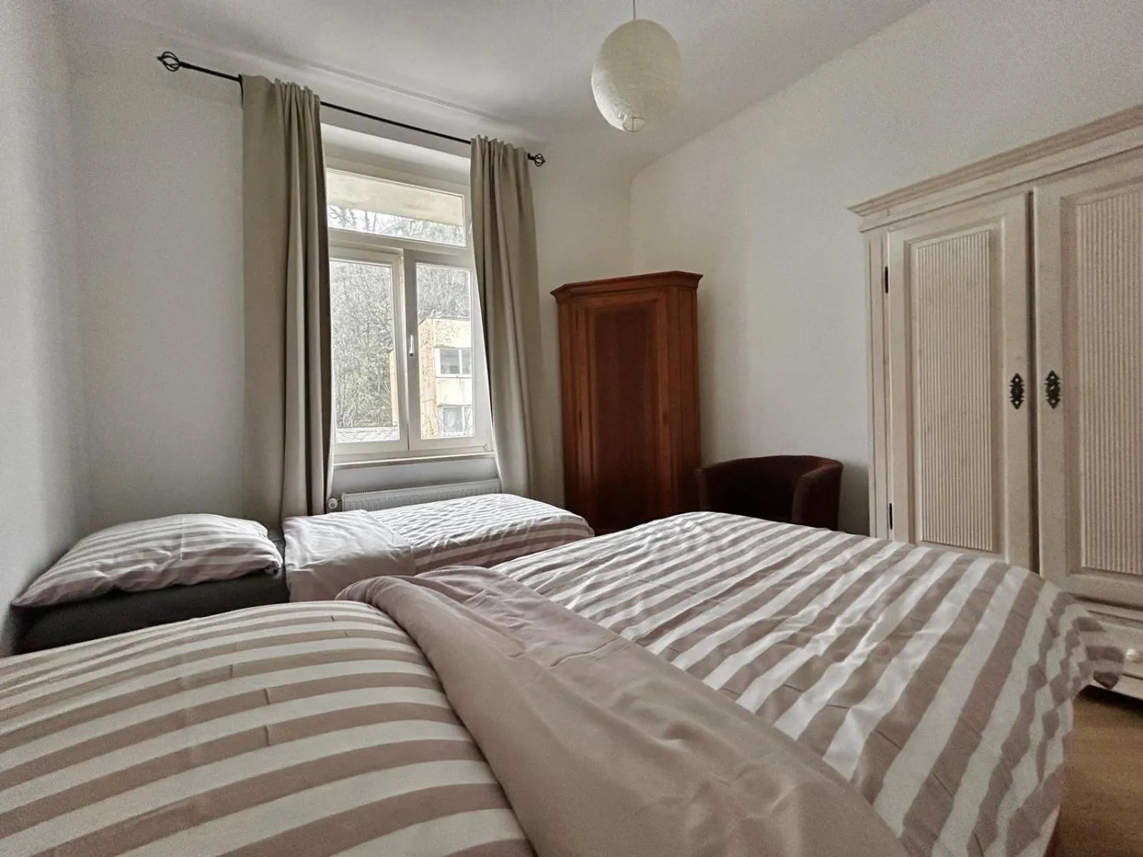 Bed in FHS ApartHotel