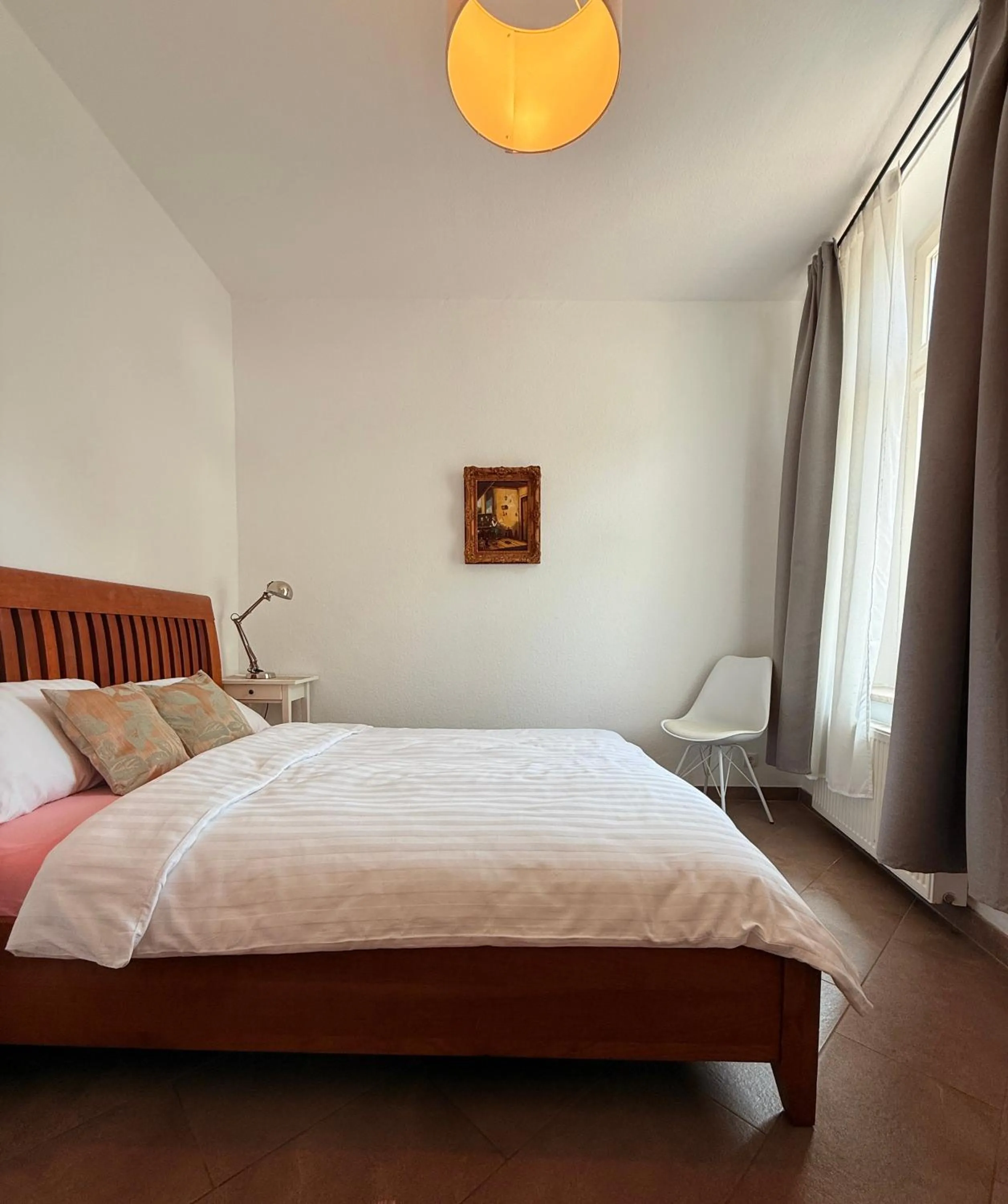 Bed in FHS ApartHotel