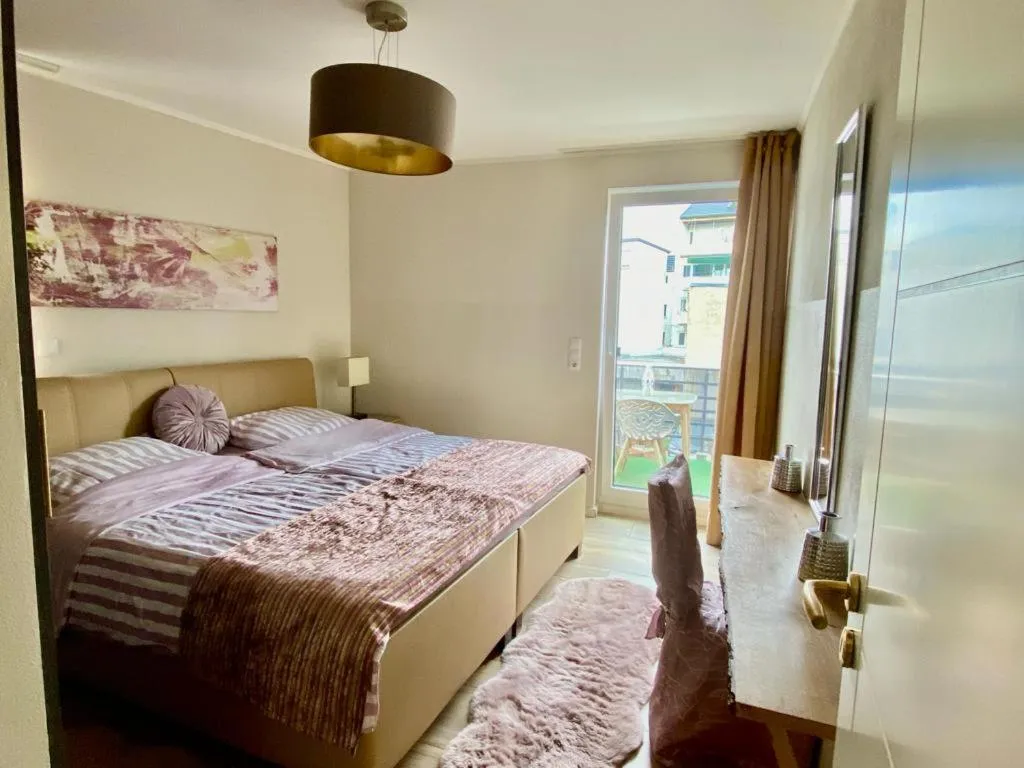 Bed in FHS ApartHotel