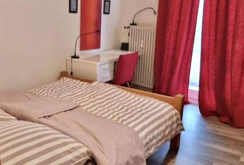 Bed in FHS ApartHotel